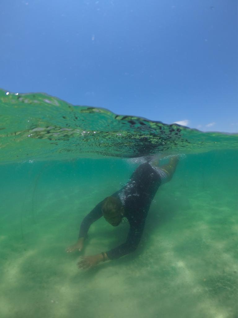 Praia e dunas no Canto de Atins com encontro do rio com o mar